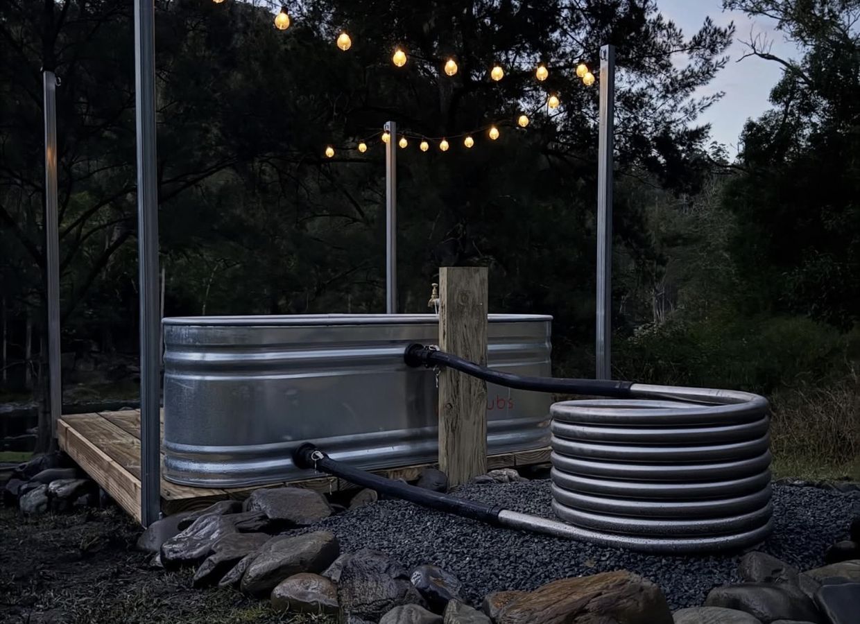 Fire tub at sunset overlooking the valley